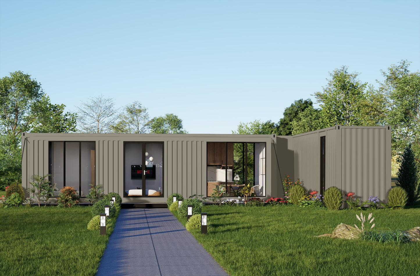 Modern container house with a garden and clear blue sky