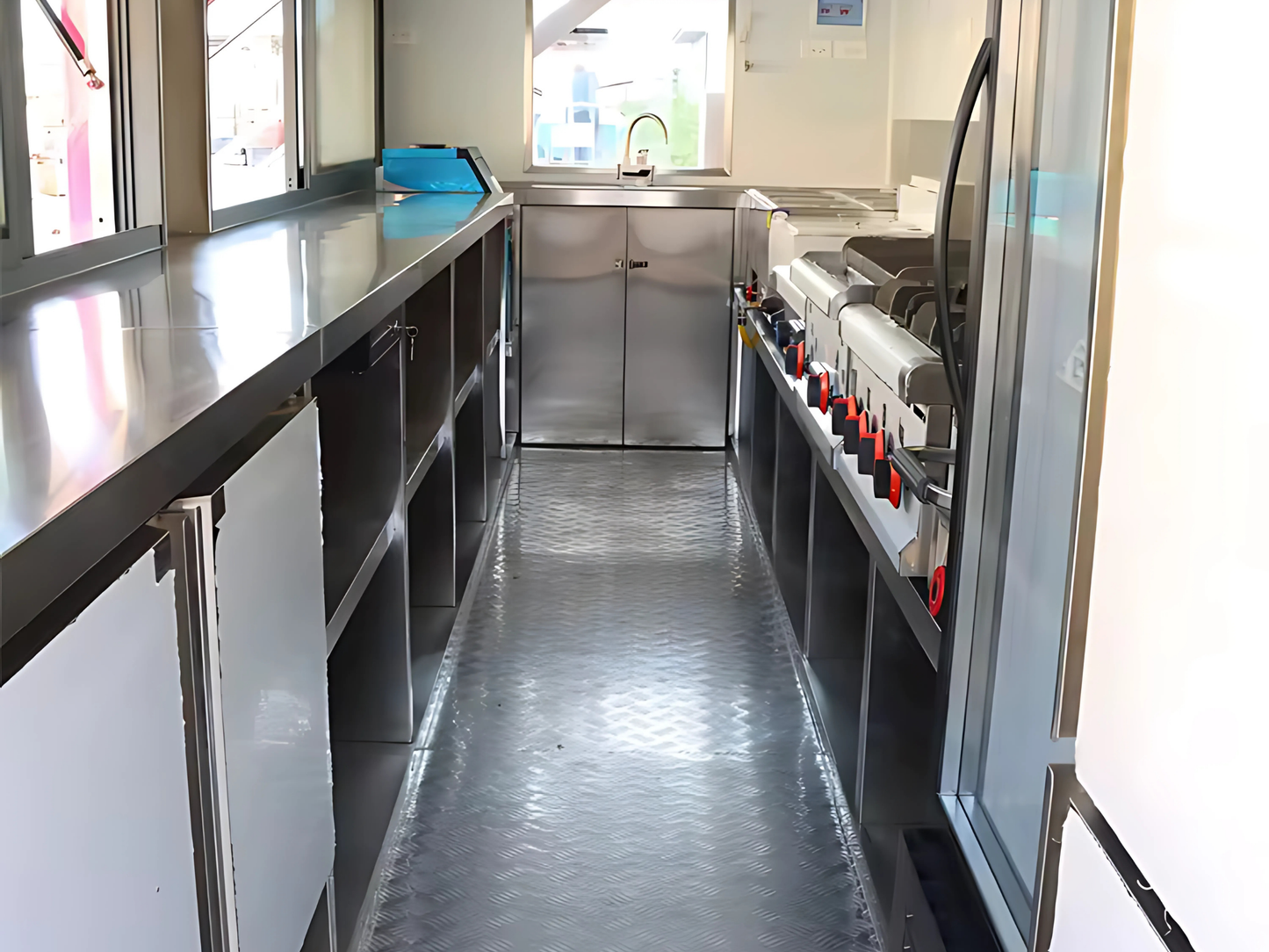 Modern kitchen with stainless steel counters and appliances