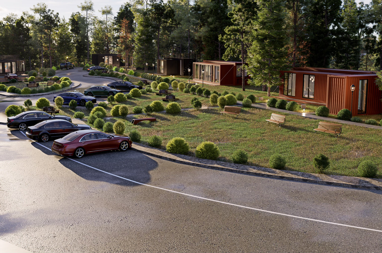 Container-style buildings with cars parked outside in a scenic area