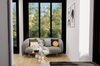 Modern living room with a gray sofa, coffee table, and decorative pillows.