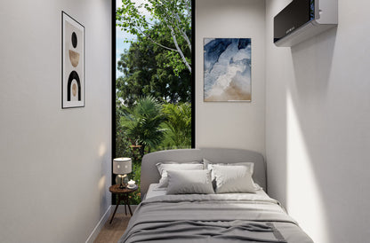 Modern bedroom with gray bedding, nightstands, and wall art.