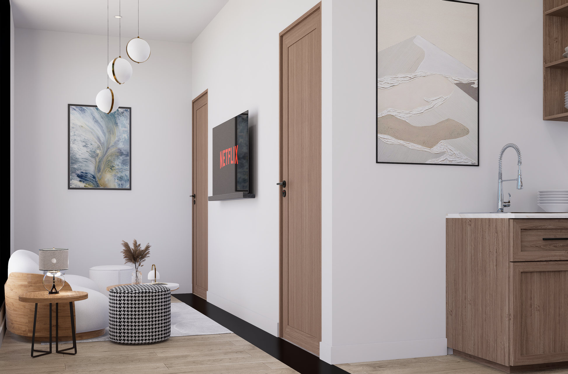 Modern interior with a kitchen and living area, featuring a TV mounted on the wall.