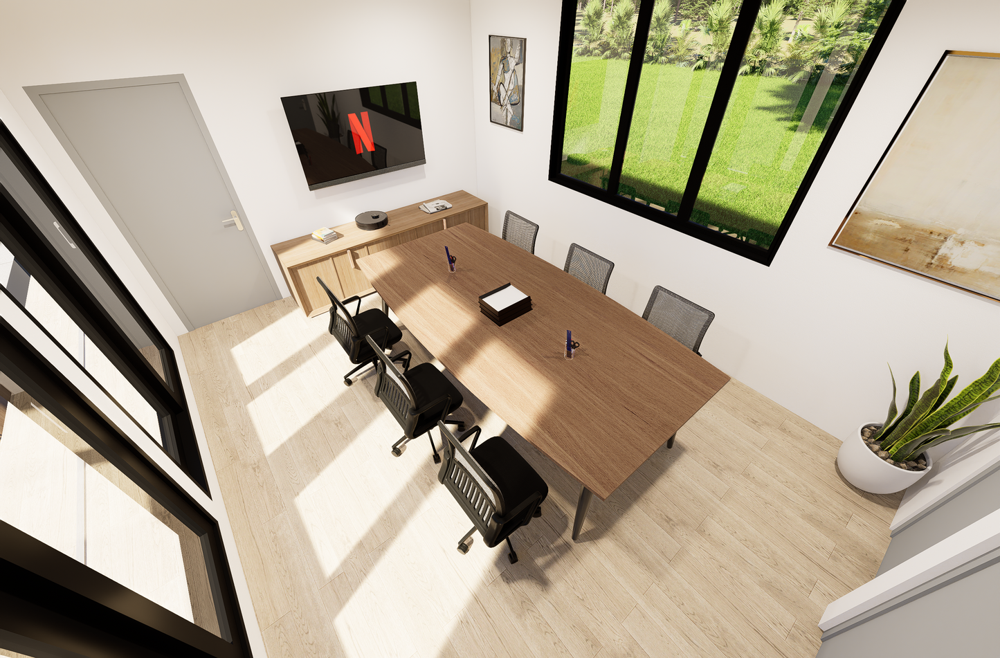 Modern office with a wooden desk, chairs, and a TV displaying a streaming service.