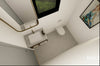 Modern bathroom interior with sink, mirror, and toilet, featuring the brand 'KOZZ'.