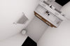 Bathroom vanity with two sinks and a mirror above it.