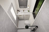 Modern bathroom interior with glass shower enclosure and white tiles
