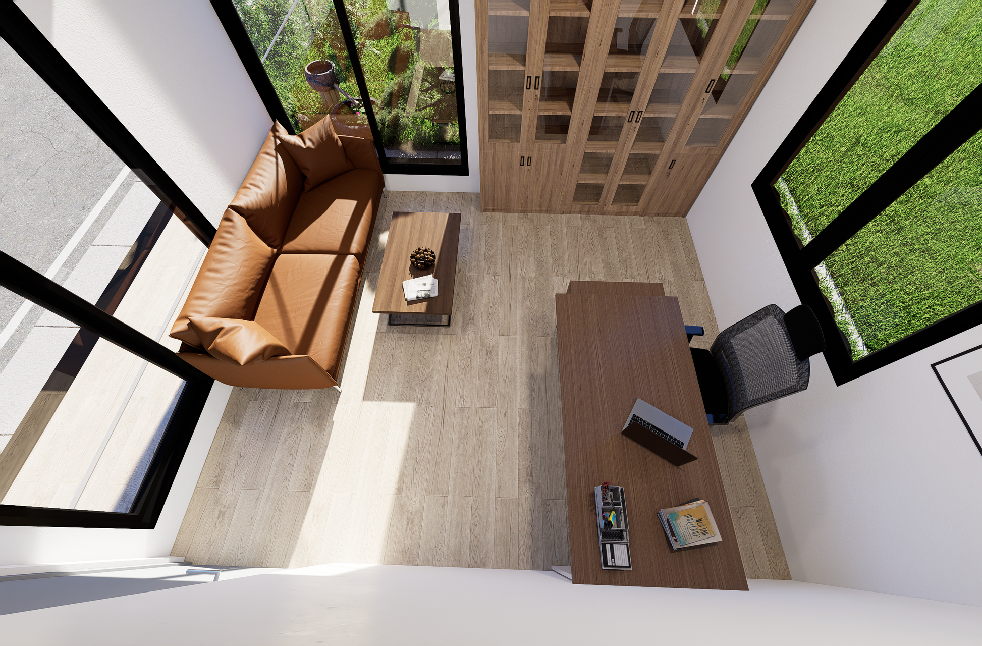 Modern office interior with a desk, chair, and sofa near large windows.