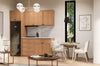 Modern kitchen with wooden cabinets, dining table, and chairs.