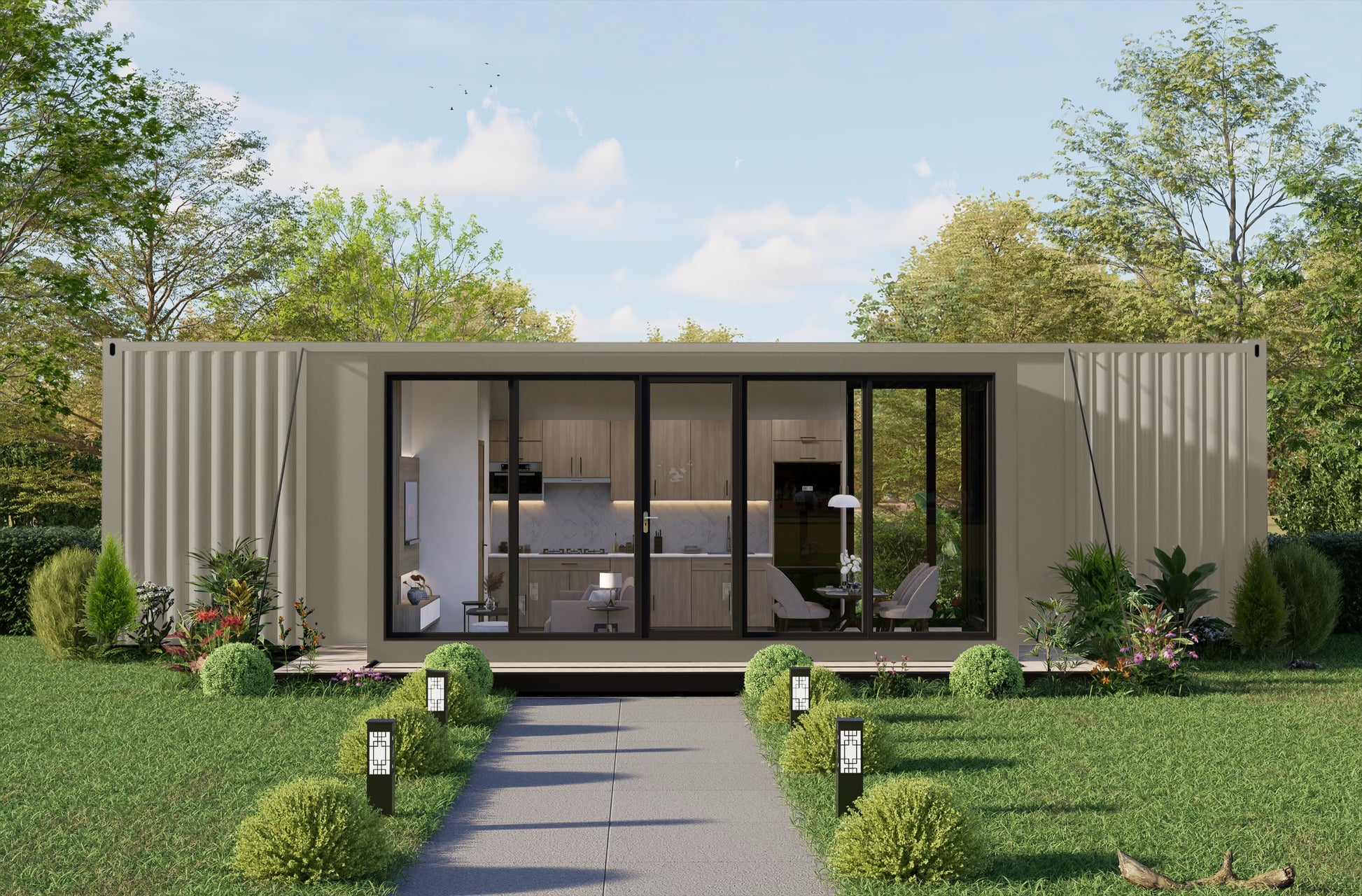 Modern container residential outdoor house design with large glass windows and a green garden.