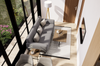 Modern living room with gray sofa, coffee table, and decorative items.