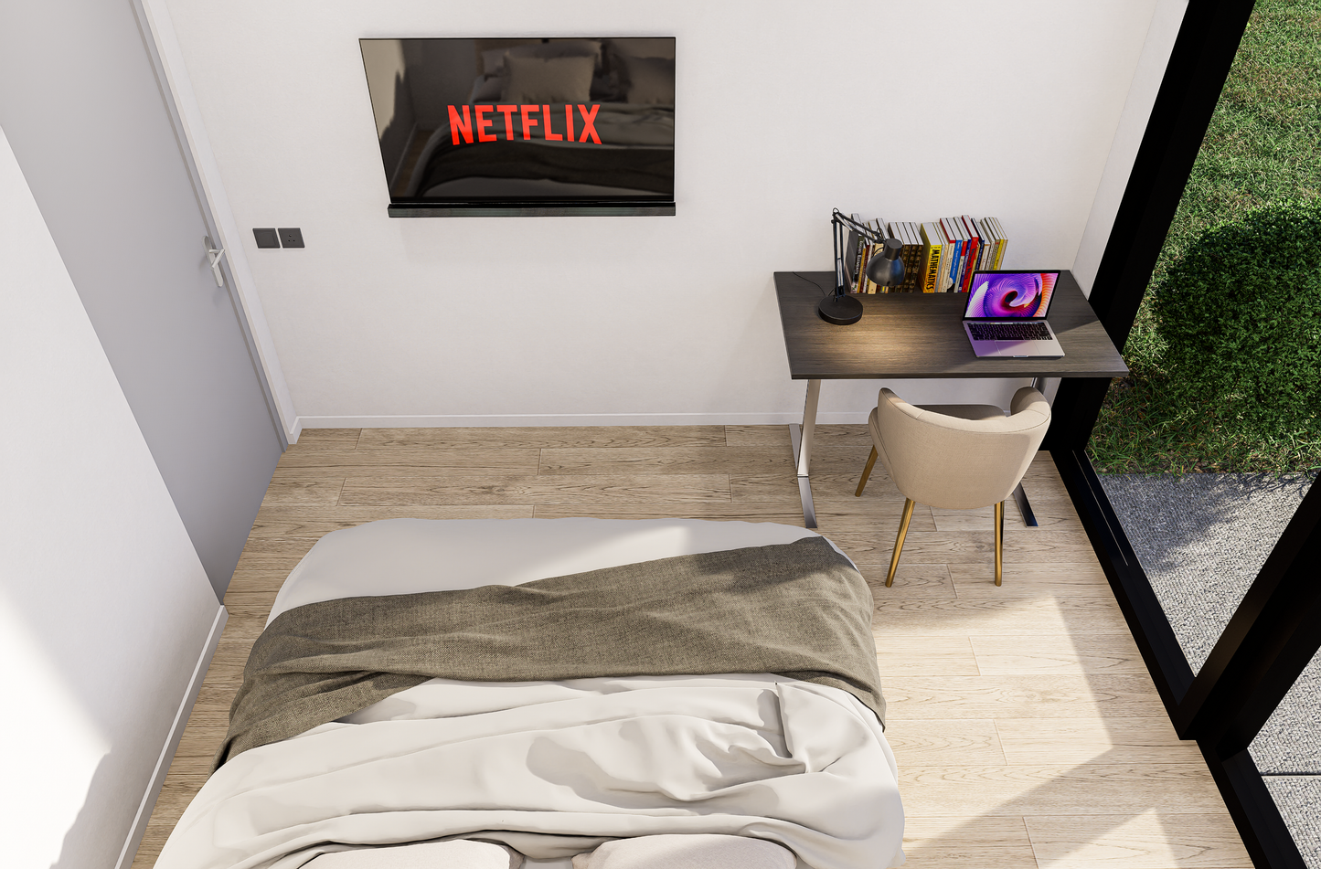 Small bedroom with a bed, desk, and TV displaying the Netflix logo.