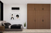 Modern bedroom with wooden wardrobe, bed, and wall art.