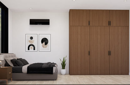 Modern bedroom with wooden wardrobe, bed, and wall art.