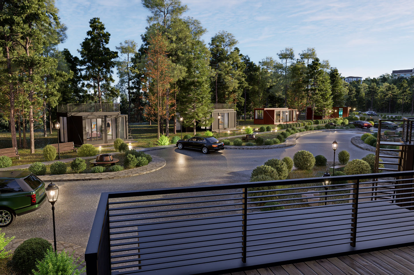 Gated community with cars, pathways, and greenery. All homes are made with shipping containers. 