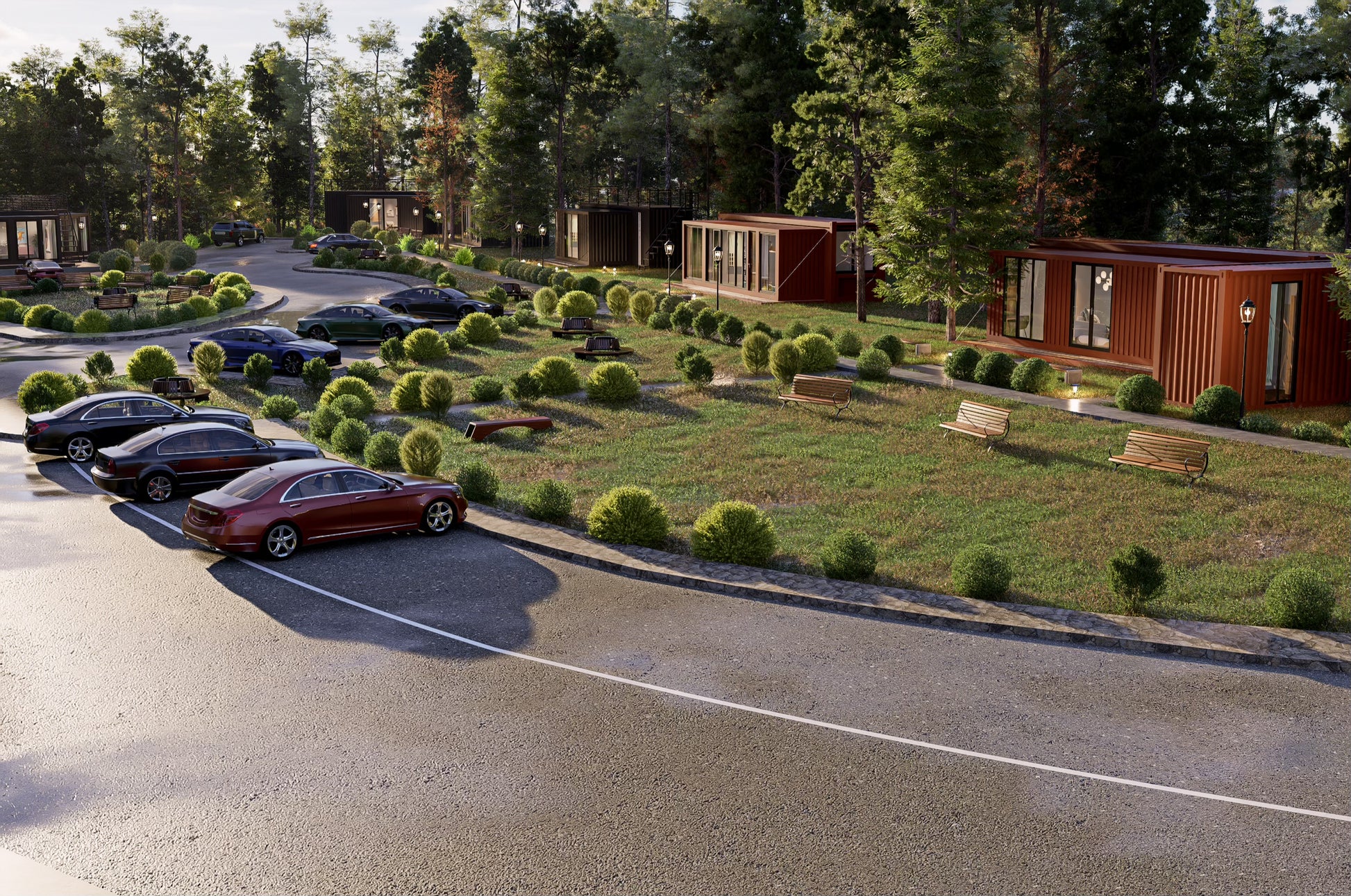 Container-style buildings with cars parked outside in a scenic area