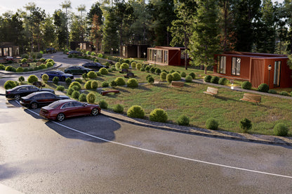 Container-style buildings with cars parked outside in a scenic area