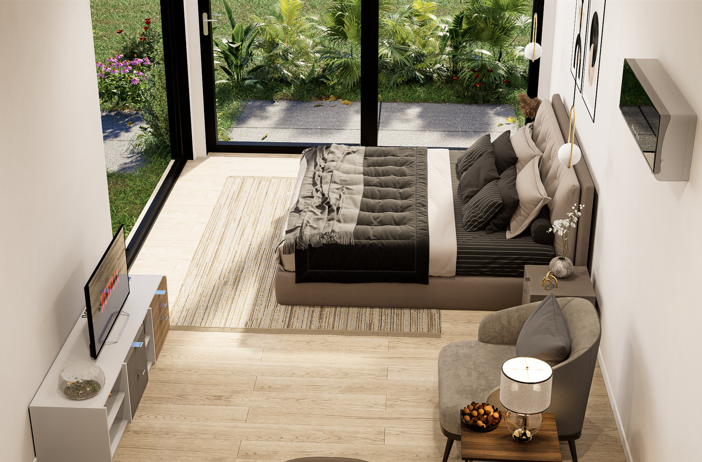 Modern living room with a sofa, TV, and decorative items.
