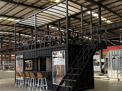 Modern industrial interior with container shop and loft area.