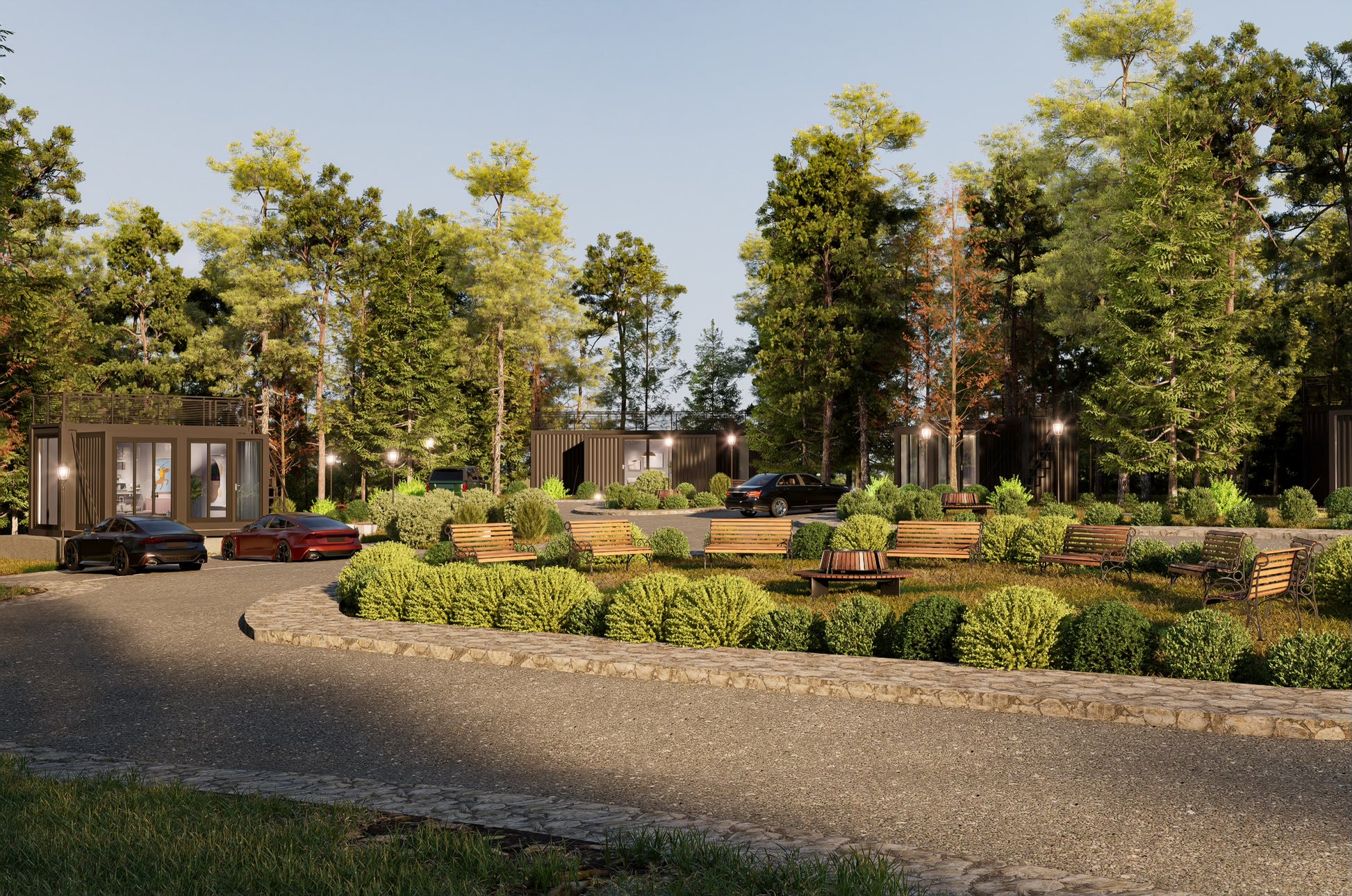 Gated community with well-maintained gardens and trees under a clear sky.