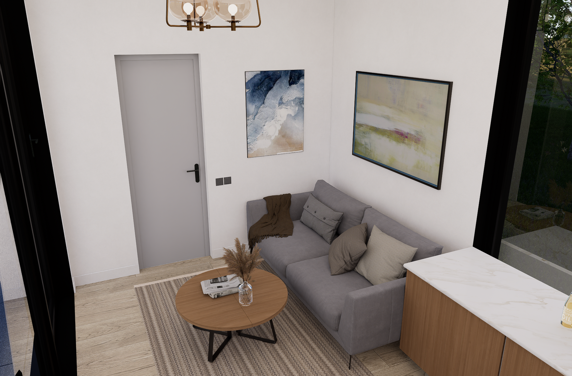 Modern living room with a gray sofa, round wooden coffee table, and abstract wall art.