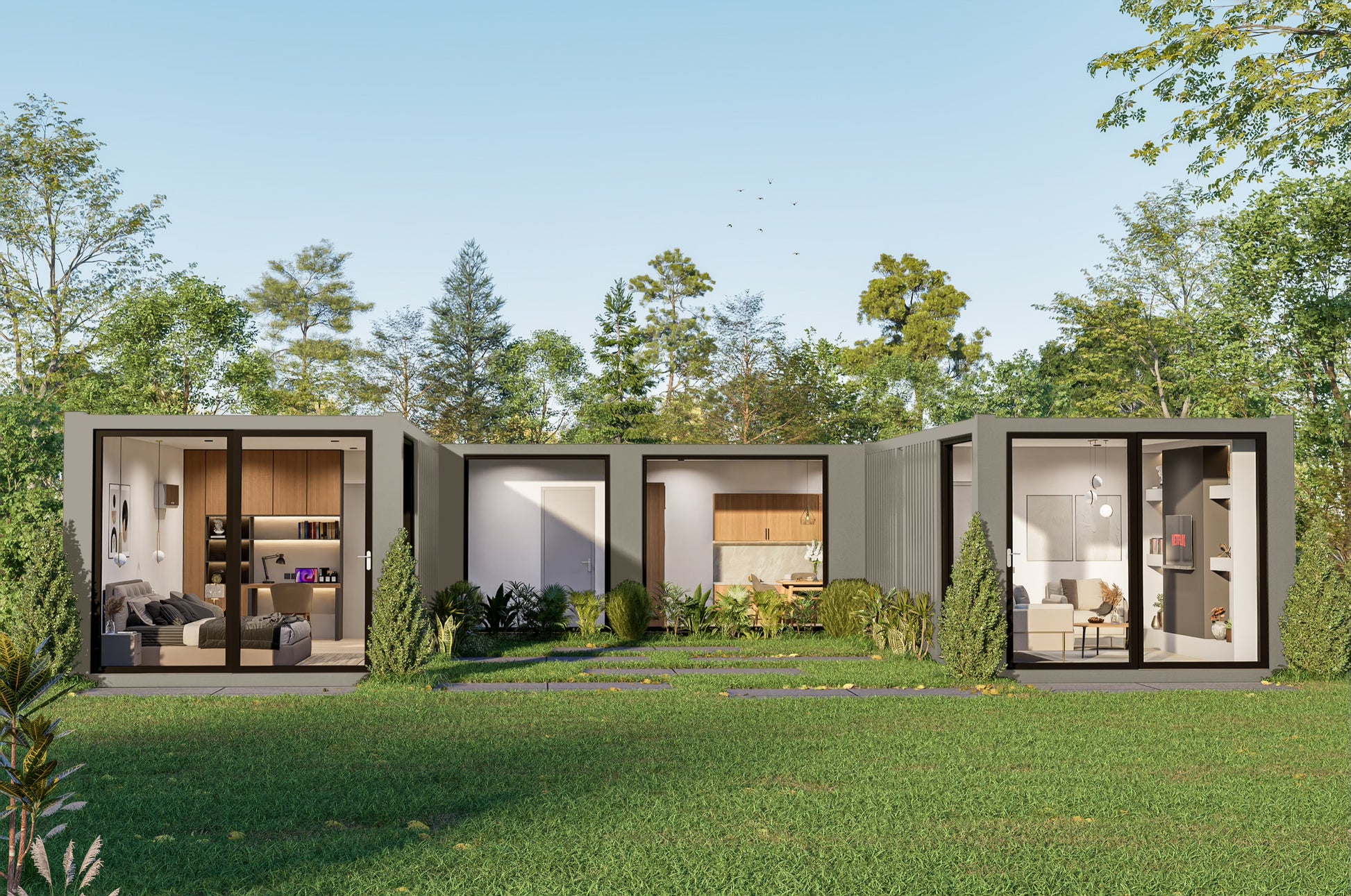 Modular building with glass doors in a green outdoor setting