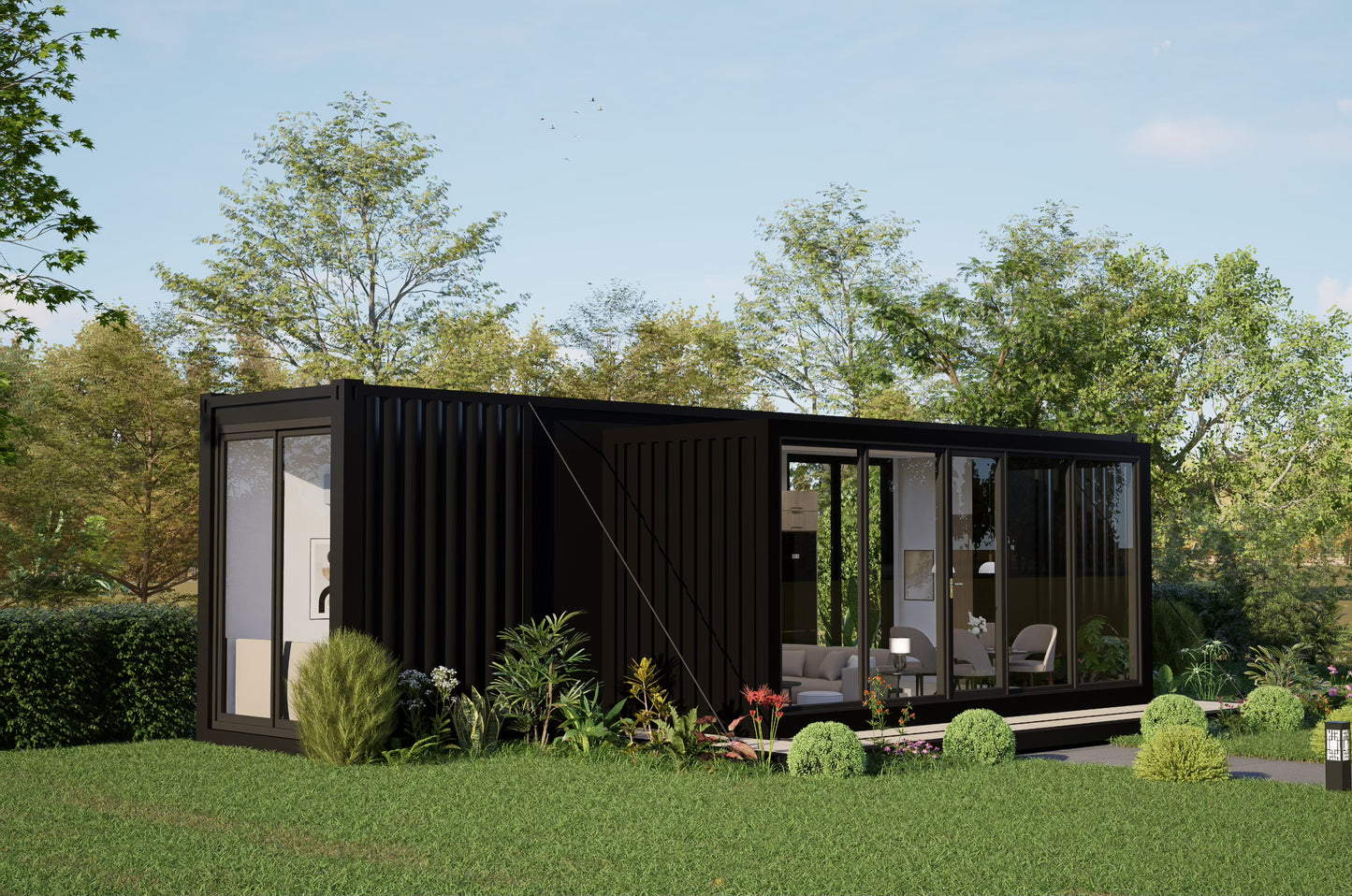 Modern black container house with glass doors in a green, tree-lined setting