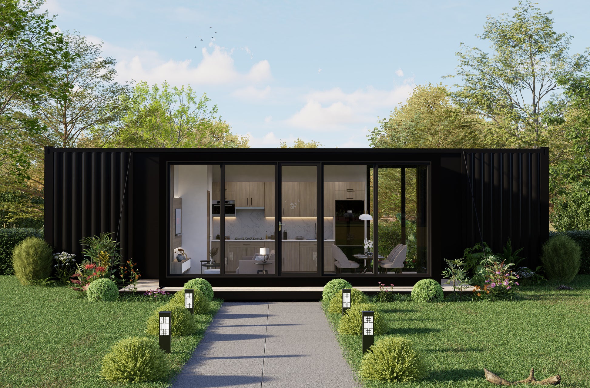 Modern black container house with large glass windows in a green, tree-lined setting.