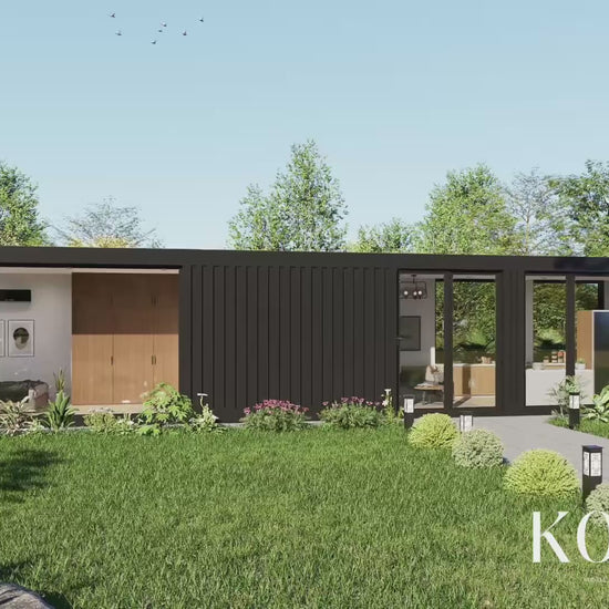 A luxury container house made using shipping containers with a garden and trees in the background